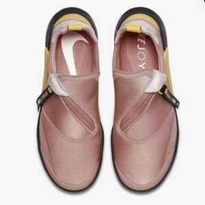 Nike JoyrideCoral and Yellow Sneakers with Vibrant Style